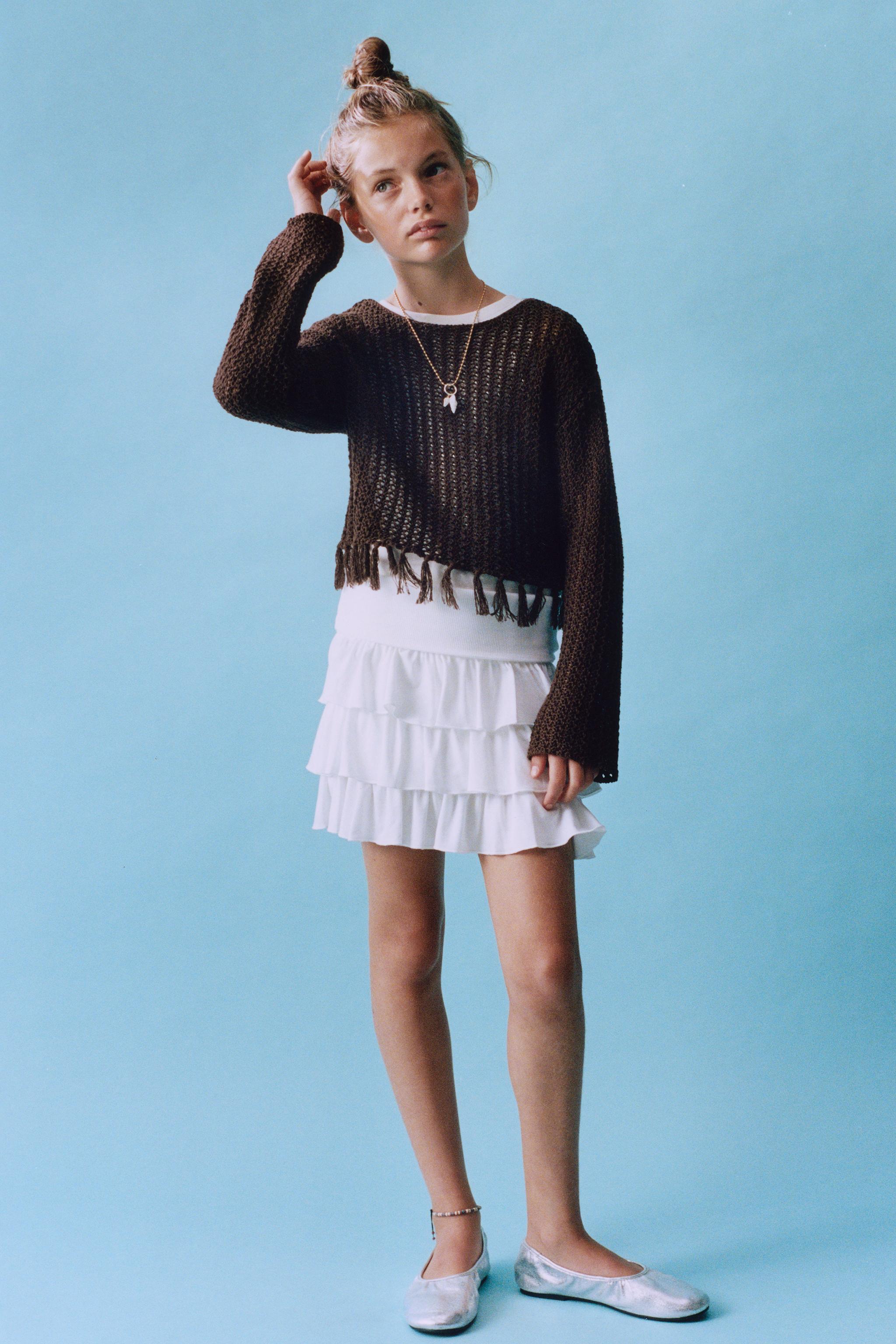 PULL EN MAILLE À FRANGES
